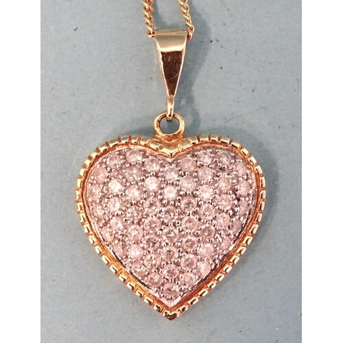 An 18ct gold heart-shaped pendant pavé-set 54 brilliant-cut ...