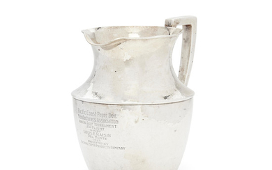An American hand-hammered sterling silver pitcher