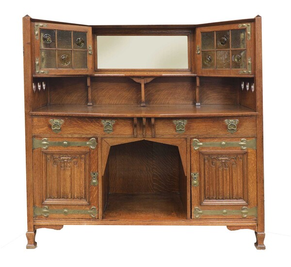 An Arts and Crafts oak sideboard
