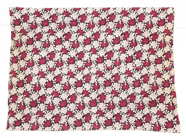 An Early 20th Century Reversible Wholecloth Quilt, printed with large...