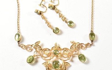 An Edwardian 9ct gold peridot and pearl necklace and earring...