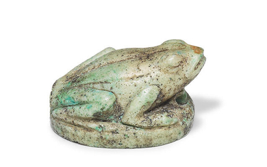 An Egyptian feldspar frog amulet