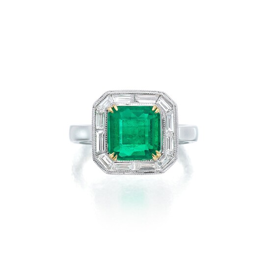 An Emerald, Diamond, and White Gold Ring