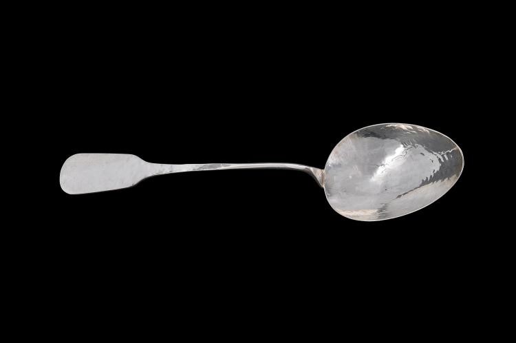 An Italian hammered silver coloured large fiddle pattern serving spoon by Brandimarte