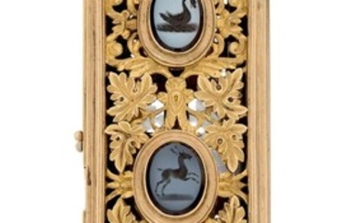 An early 19th century gold buckle, the rectangular gold pierced foliate panel set with three hardstone nicolo intaglios each engraved with an animal including a swan, deer and fly, within collet mounts, to steel claw fittings, c.1830, approx...