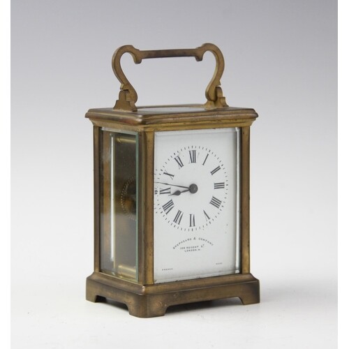 An early 20th century French brass cased carriage timepiece,...