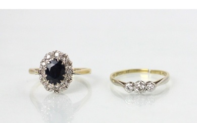 An early 20th century diamond set three stone ring, the mixe...
