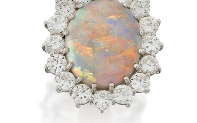 An opal and diamond cluster ring, the central claw-set oval cabochon opal within brilliant-cut diamond border, approximate dimensions of opal 16.0mm x 13.5mm in 18ct white gold mount, London hallmarks, approx. ring size L