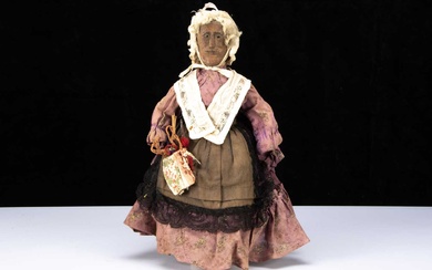 An unusal 19th century English wooden Folk Art elderly lady doll