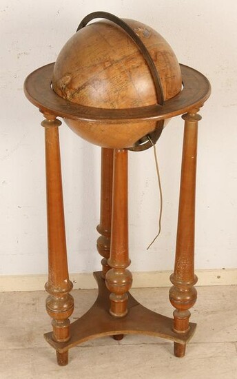Antique French globe with walnut holder. Glass globe