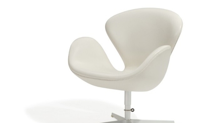 Arne Jacobsen: “The Swan”. Lounge chair upholstered with white leather, on lacquered aluminum star base. Manufactured by Fritz Hansen.