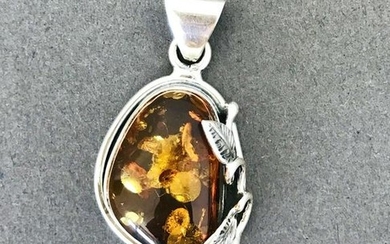 Beautiful Amber Pendant shaped like an Ornament