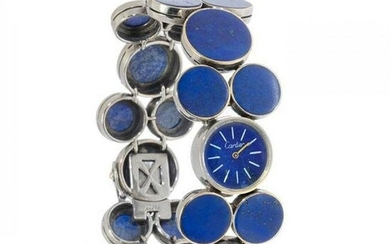 CARTIER watch, 70s, n. 19056, bracelet model 20819, for women. In white gold and lapis lazuli. Case