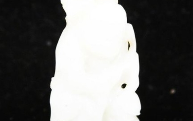 CHINESE CARVED JADE FIGURE OF BOY, 19TH C.