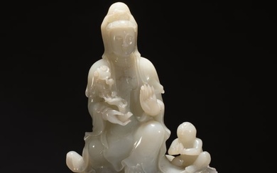 CHINESE CARVED JADE GUANYIN ON STAND