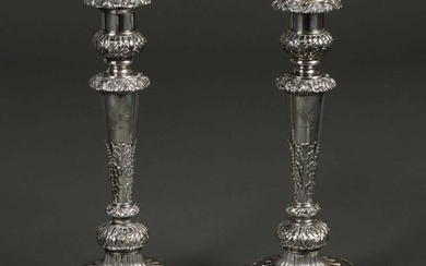 Candlesticks. A pair of George III silver candlesticks