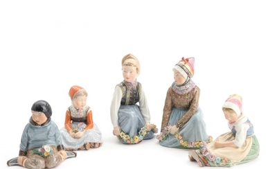 Carl Martin-Hansen: Five Royal Copenhagen porcelain figurines in folk costumes decorated in overglaze colours. H. 10–15 cm. (5)