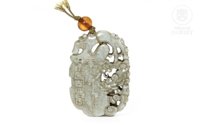 Carved jade piece and an amber bead, Qing Dynasty.