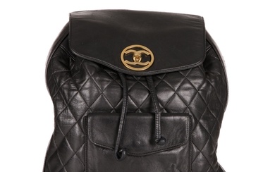 Chanel, a vintage black quilted leather backpack w/pouch, fe...
