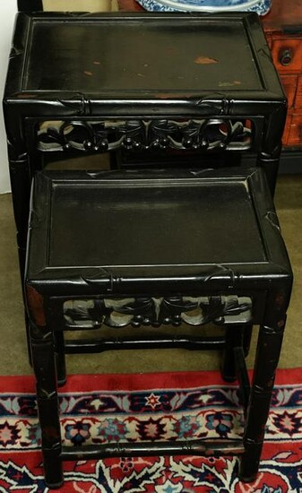 Chinese nest of two ebonized tables with bamboo carving