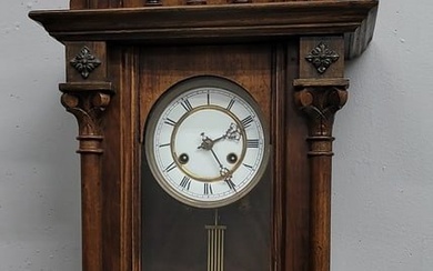 Circa 1890's ornate Vienna wall clock with porcelain dial and RA pendulum. All in good condition.