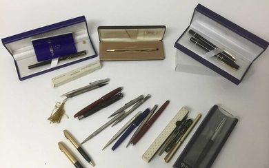 Collection of pens and silver propelling pencils