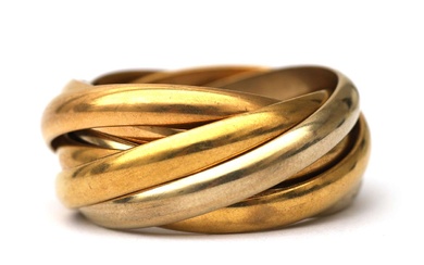 Een 18 krt. tri-colour gouden brede ring