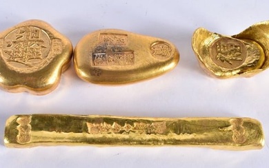 FOUR CHINESE YELLOW METAL SCROLL WEIGHTS 20th Century. 401 grams. Largest 12 cm x 1.5 cm. (4)