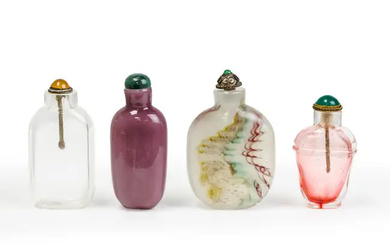 Four Chinese glass snuff bottles Late Qing dynasty-20th century Comprising: a translucent,...