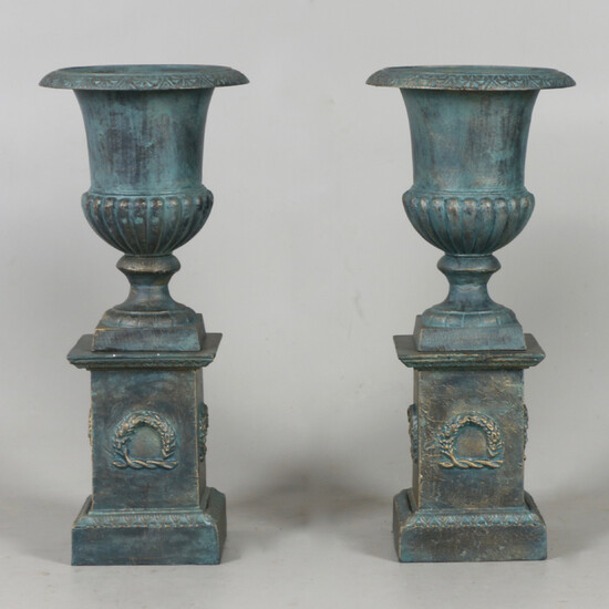 GARDEN WELLS, on plinth, a pair, cast iron, contemporary.