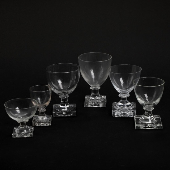“Gorm den Gamle/Emma”. A selection of glasses on massive four-sided bases. Holmegaard...