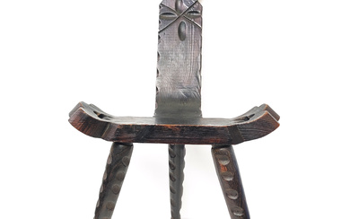 HISTORY AND AESTHETICS COMBINED: CARVED WABI SABI THREE-LEGGED CHAIR FROM FRANCE.