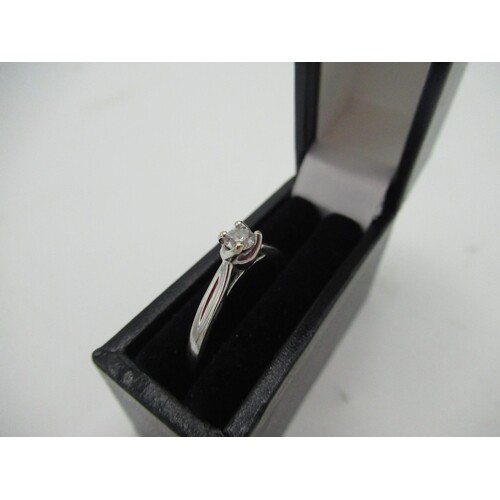 Hallmarked 9ct white gold solitaire ring with twisted claw m...