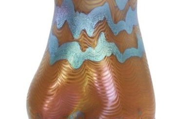 Loetz (Austrian), an iridescent Phaenomen glass vase, c.1902, PG 85/5032, engraved ‘Loetz Austria’ on ground-out pontil, The body having a clear glass layer over pale milky-pink, the neck rim of triangular section and the bulbous body with twisted...