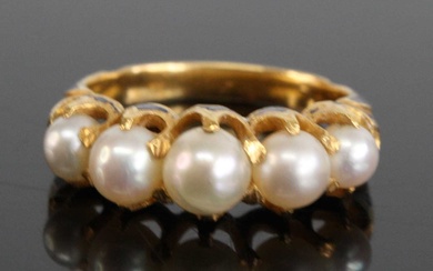 Lot details A yellow metal pearl half hoop ring, comprising...