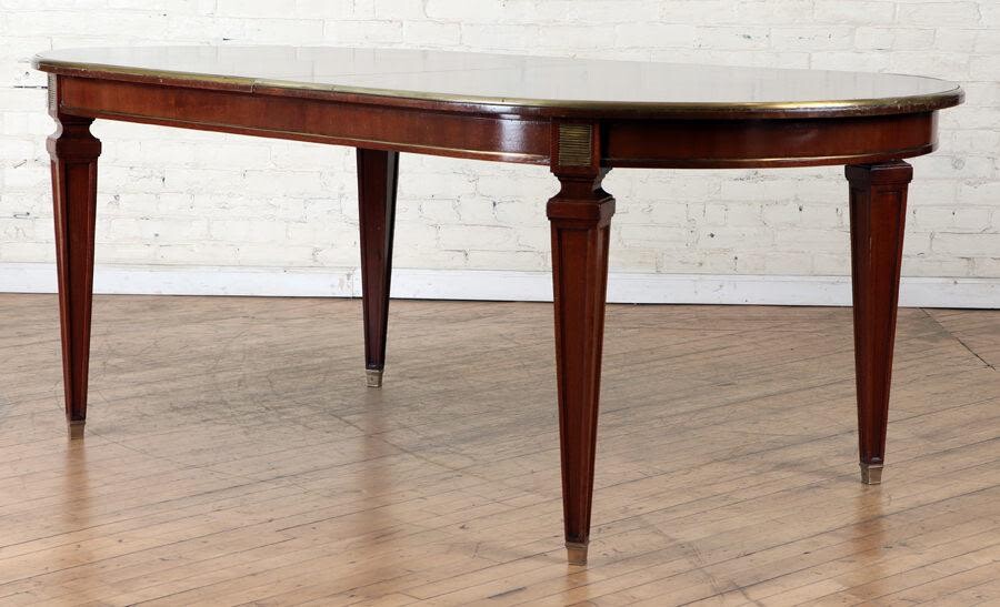 MAHOGANY BRONZE MOUNTED EXTENDING DINING TABLE