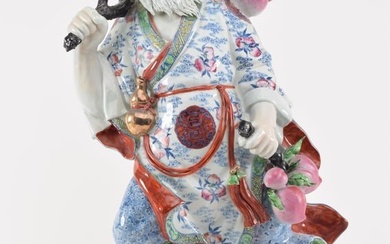 Mid 20th century large Chinese porcelain figure. Wise man with peaches. Carved eyebrows and beard.