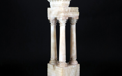 Modello del tempio di Apollo in alabastro su base gradinata in marmi diversi....