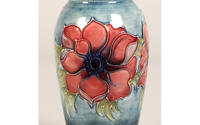 Moorcroft pottery vase of baluster form, pale blue ground in...