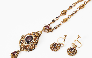 NECKLACE, EARRINGS, 1 pair, gilt silver, black and white enamel decor and faceted garnets and orientated beads.
