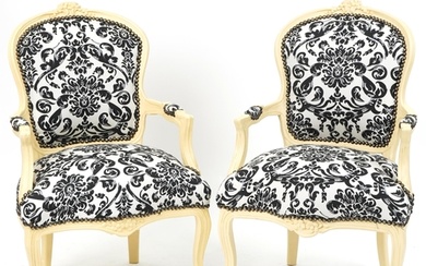 Pair of French style cream painted elbow chairs, each having...