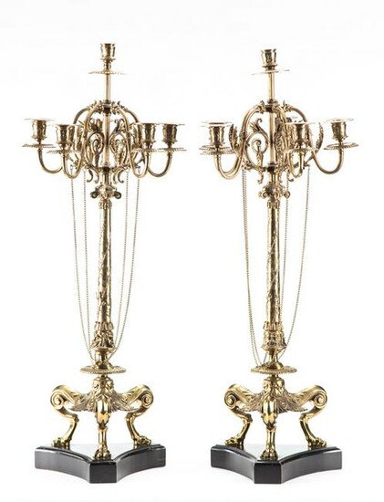 Pair of very ornate Candelabras on unique footed bases