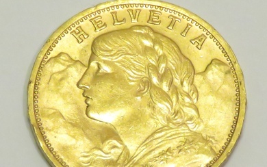 Pièce en or de 20 Francs "Helvetia" datée de 1935. Poids : 6g45. Diam :...