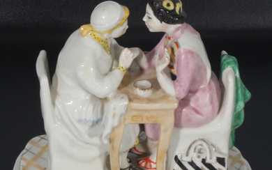 Porcelain figure "Manicure/Gossip Girl" 1950-1960. Sculptor - Malysheva Nina Aleksandrovna / Малышева Нина Александровна. Porcelain, painting, gilding. 18x18.5 cm. With a gap