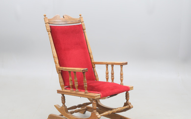 ROCKING CHAIR American model with footstool, label marked a.b möbelindustrikompaniet, tranås.