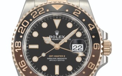 ROLEX. A STAINLESS STEEL AND 18K PINK GOLD AUTOMATIC DUAL TIME WRISTWATCH WITH SWEEP CENTRE SECONDS, DATE, BRACELET, GUARANTEE AND BOX