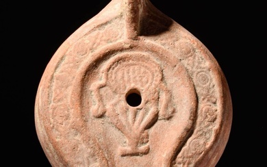 ROMAN TERRACOTTA OIL LAMP WITH A KRATER