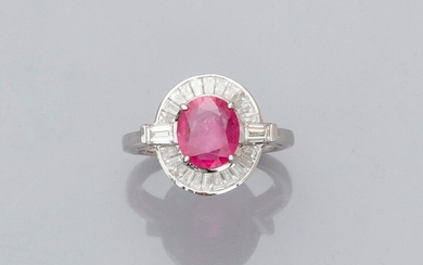 Ring in white gold, 750 MM, set with an oval ruby, Burmese origin, weighing 1.97 carat shouldered and surrounded by baguette-cut diamonds, total about 1 carat, GGT laboratory certificate, size: 53, weight: 6.2gr. rough.