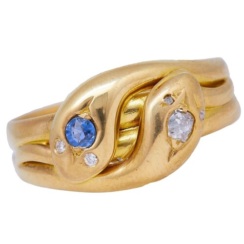 SAPPHIRE AND DIAMOND DOUBLE SNAKE RING, in 18 ct gold. desig...