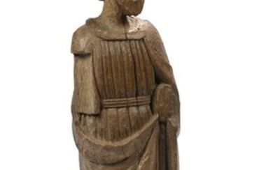 Saint apôtre en bois sculpté, anciennement polychromé. Statue monoxyle figurant...